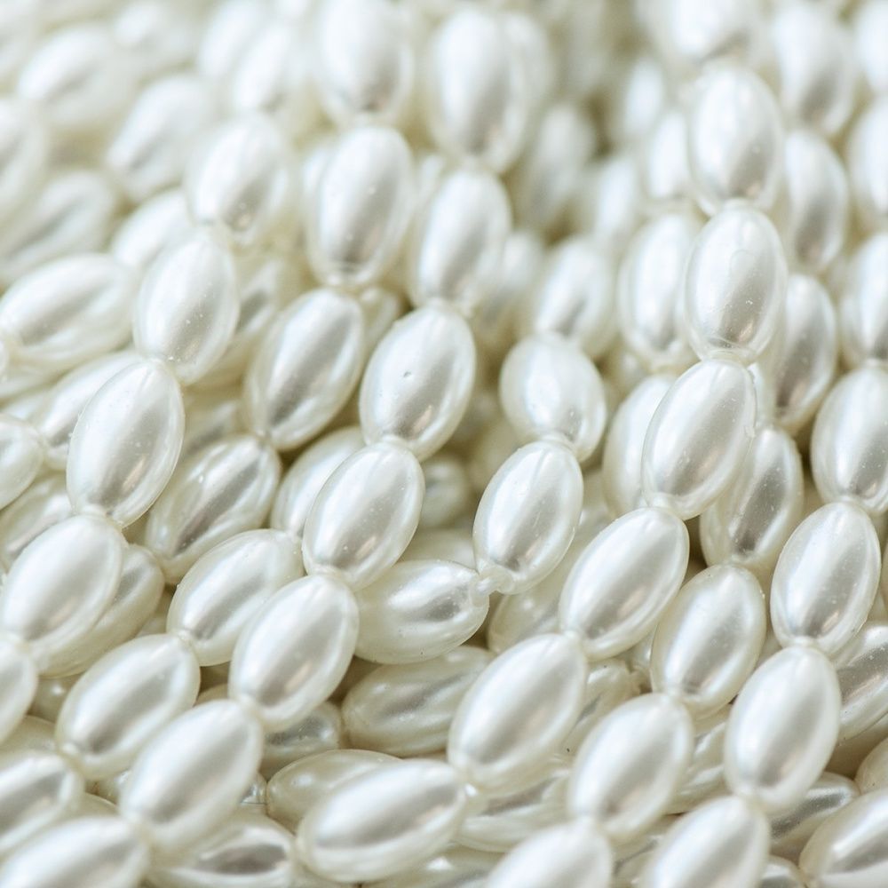 бусина, имитация жемчуга "рис", стекло, цвет белый, 7х4 мм (уп 30+/-5 шт)