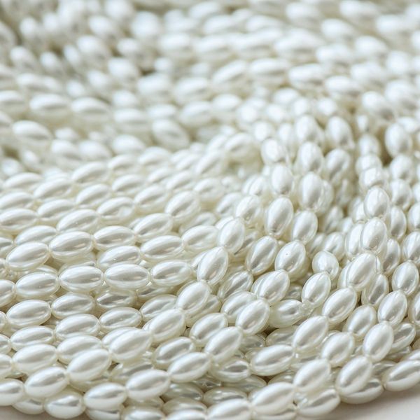 бусина, имитация жемчуга "рис", стекло, цвет белый, 7х4 мм (уп 30+/-5 шт)