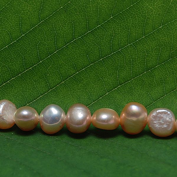 речной жемчуг "барокко", цвет персиковый, д 7-8 мм (шт) 