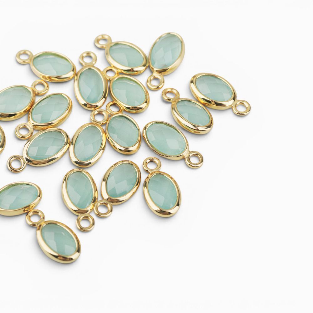 подвеска металл "эллипс", позолота/св.аквамарин, 9x4.5x2 мм