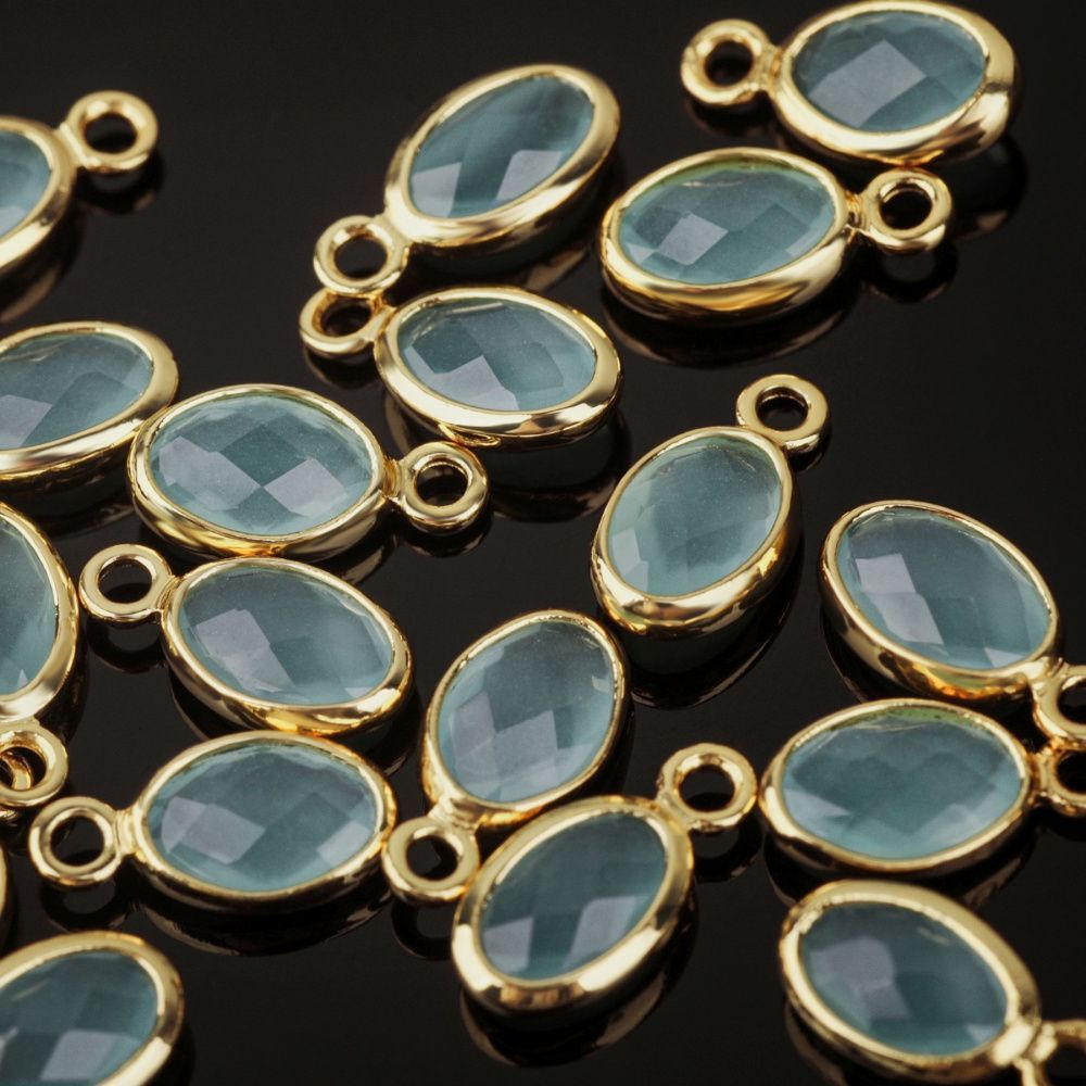 подвеска металл "эллипс", позолота/св.аквамарин, 9x4.5x2 мм