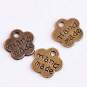 Подвеска металлическая "Hand made-цветочек", цвет античная бронза, 8.5x8x1 мм