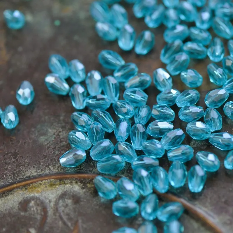 бусина "капля", граненая, стекло, цвет светло-бирюзовый радужный, 6х4 мм