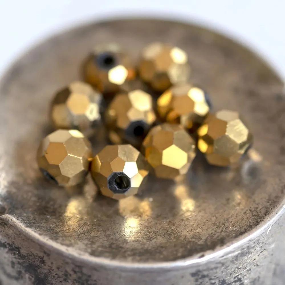 бусина, стекло 4, граненая, цвет золотой, 4 мм (уп.30+/-5 шт)