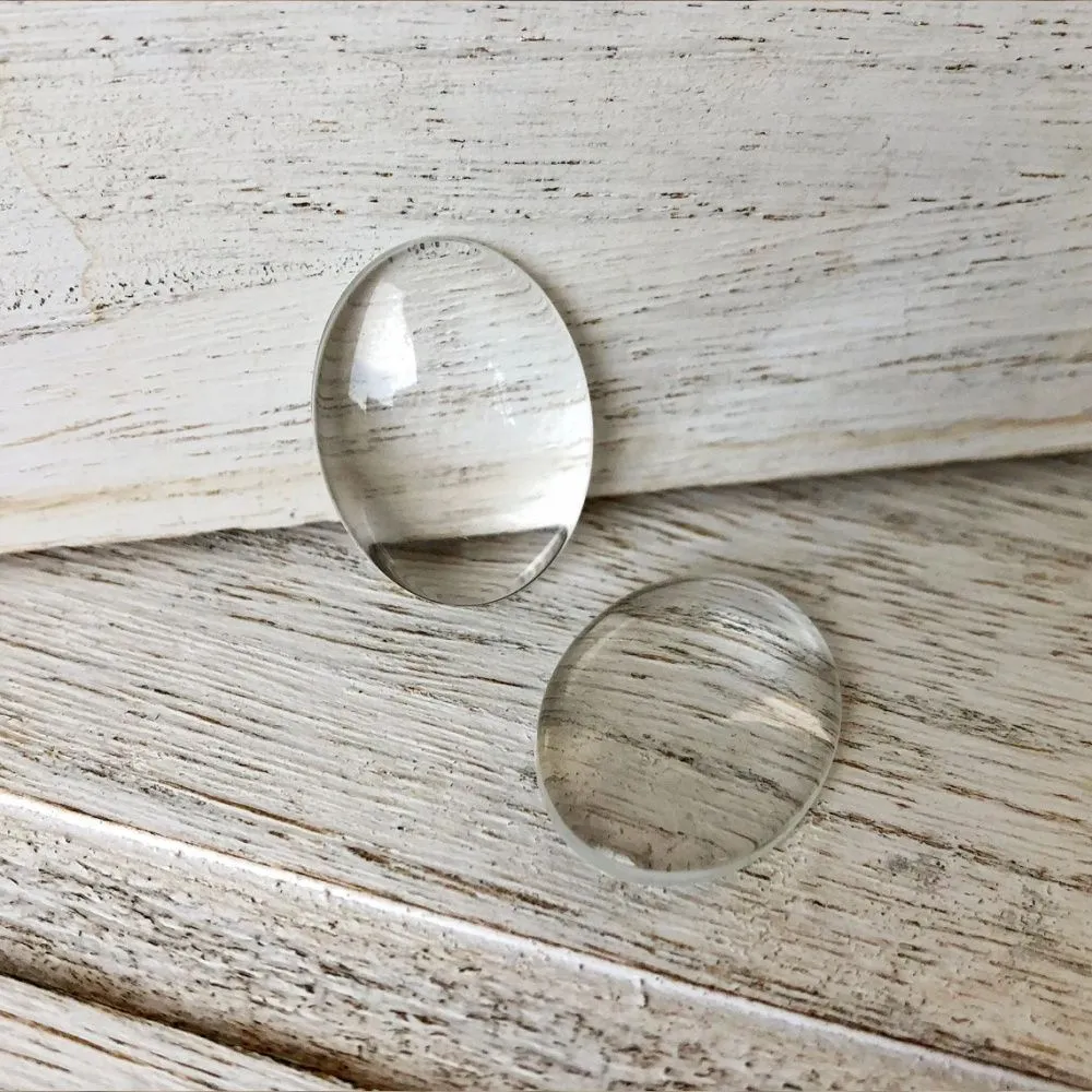 кабошон стеклянный, овальный, прозрачный, 35х25х6 мм