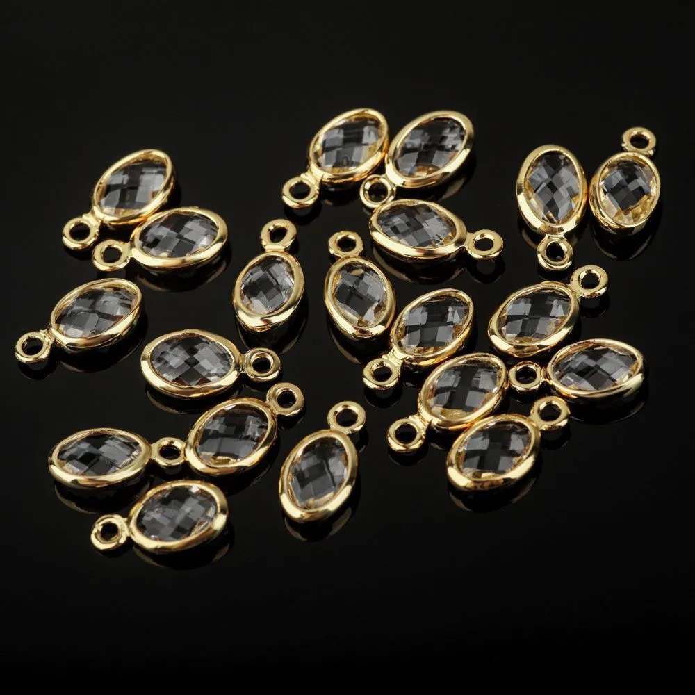 подвеска металл "эллипс", позолота/прозрачный, 9x4.5x2 мм