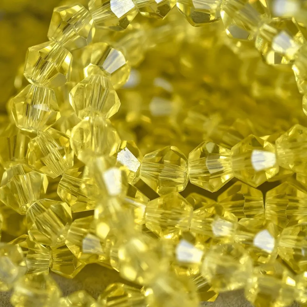 бусина, стекло биконус, цвет желтый, 4 мм (уп.30+/-5 шт)