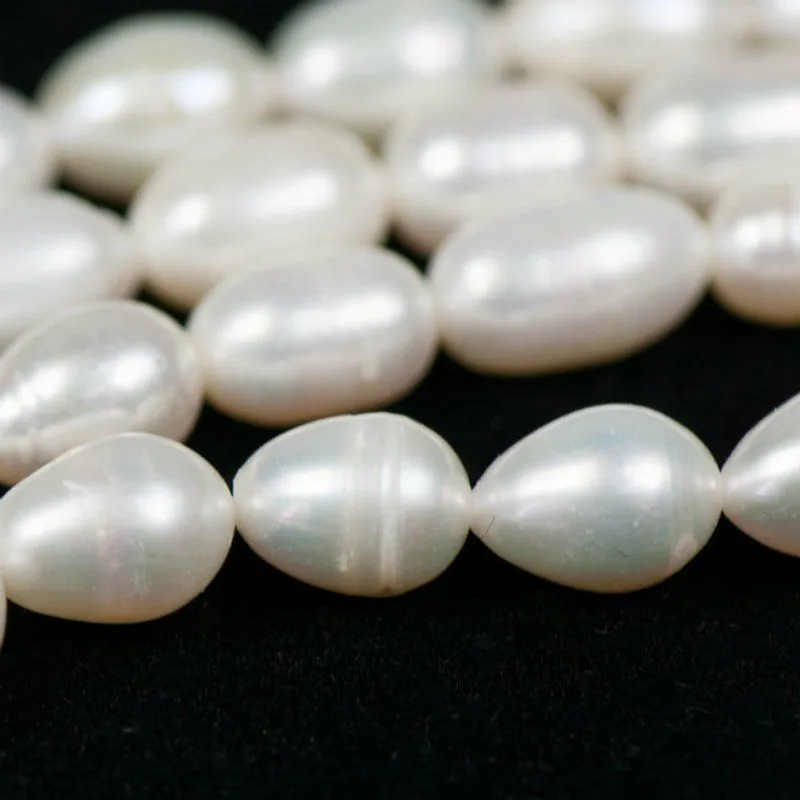 речной жемчуг вытянутой формы, цвет белый, размер 7-8 мм (стрэнд 39 шт)