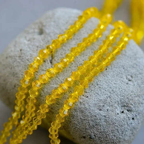 бусина, стекло биконус, цвет насыщенный желтый, 4 мм (уп.30+/-5 шт)